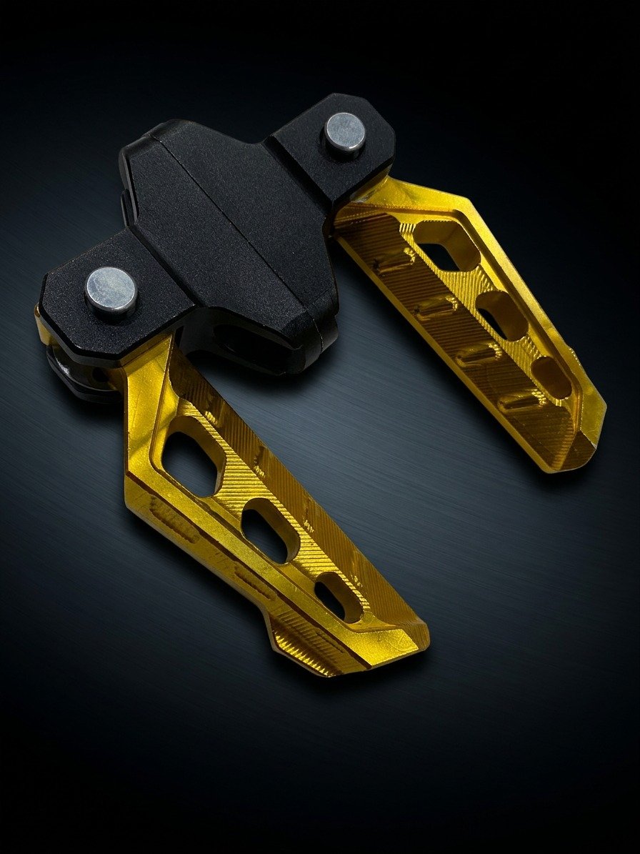 CNC Aluminum Foldable Motorcycle Footrest Gold CNC aluminum foldable motorcycle footrest gold anti slip universal foot peg